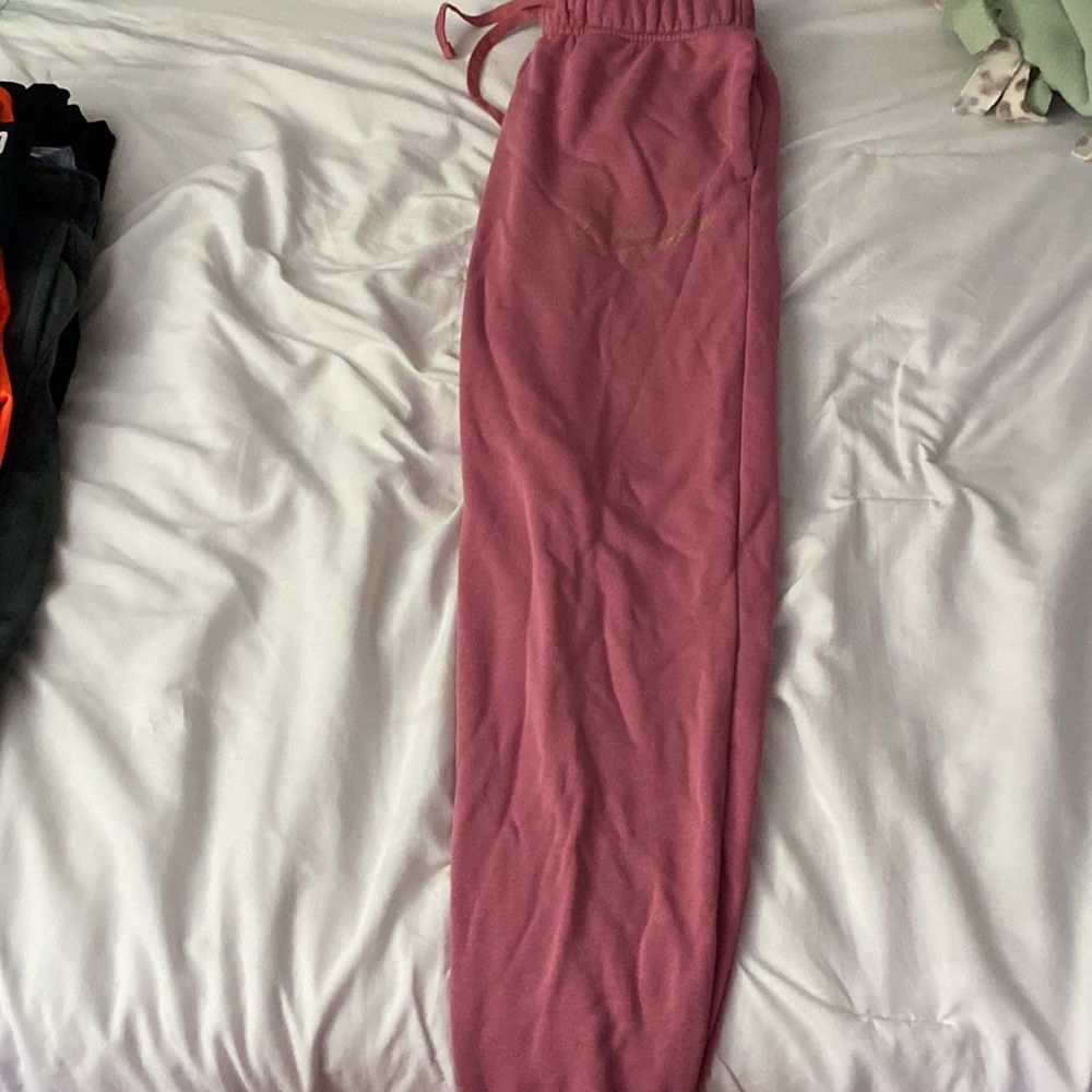 pink nike sweatpants, gold swoosh womens xs